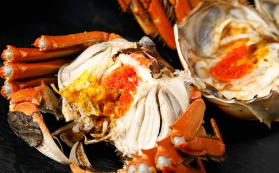 吃螃蟹拉黑色大便怎么回事 螃蟹吃完胃難受怎么辦